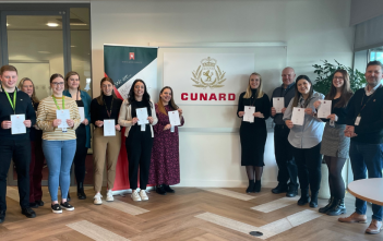 More colleagues earn their White Star Service pin Shoreside colleagues pose with their White Star Service certificate and pin.